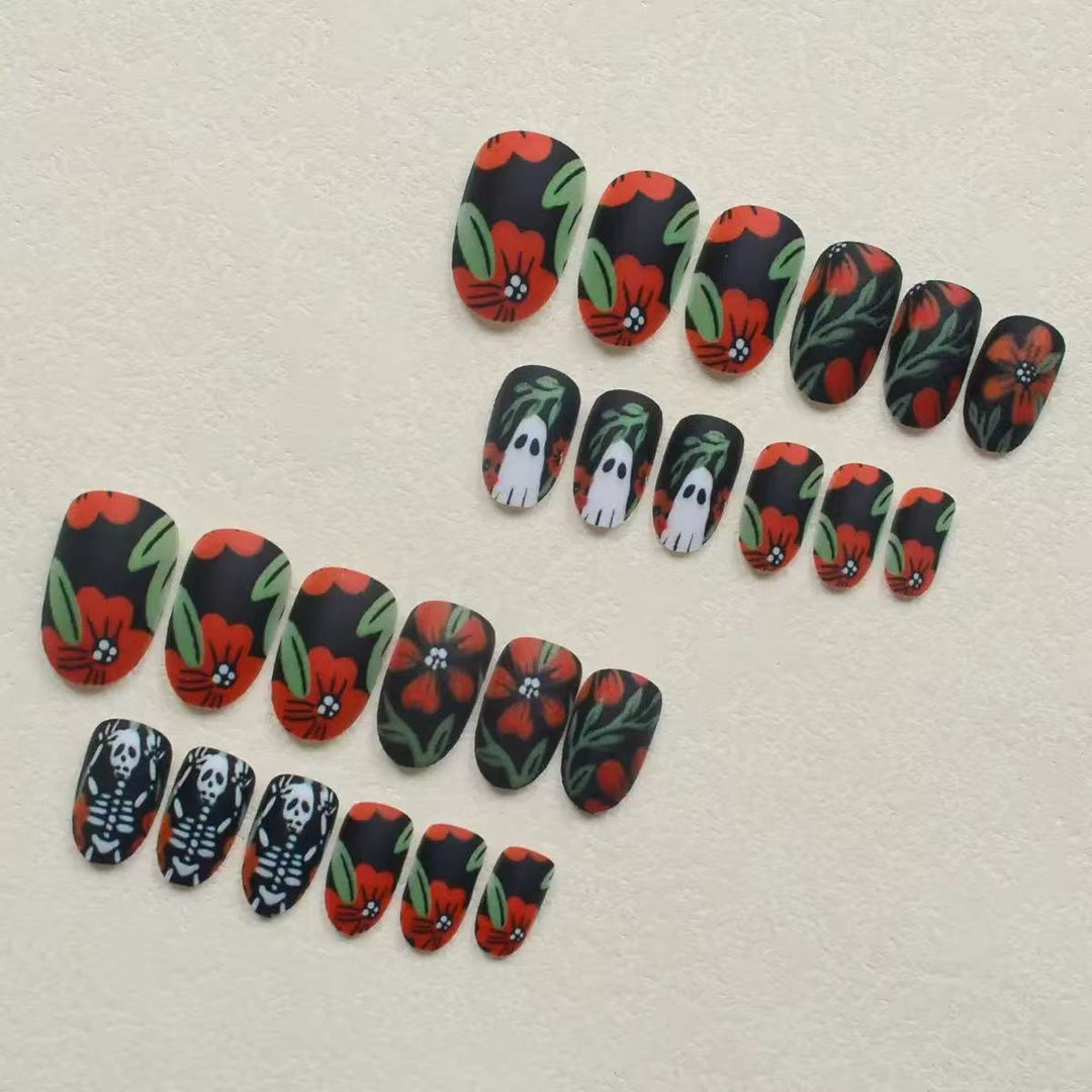 Acrylic nail set with creepy Halloween designs and floral accents Kalsten