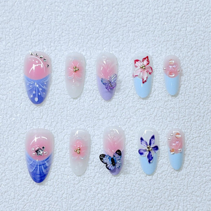 Artful Nail Art with Floral Details and Butterflies Kalsten