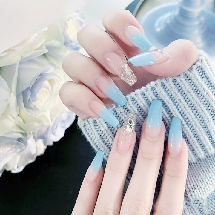 Nail set with elegant ombre and glitter accents Kalsten