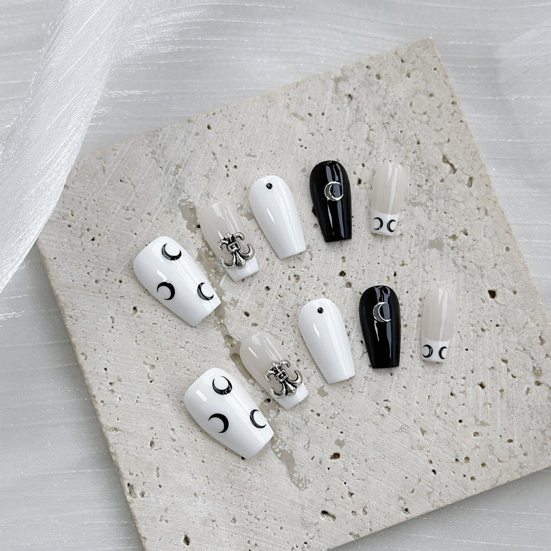 Artistic Press-On Nail Art Set with Elegant Moon and Star Designs