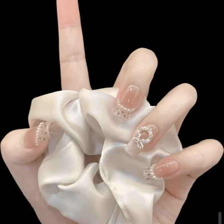 Glamorous artificial nails with sparkling decorations Kalsten