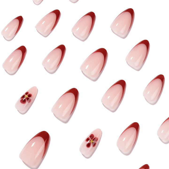 Elegant and artistically designed stiletto nails with flower design Kalsten