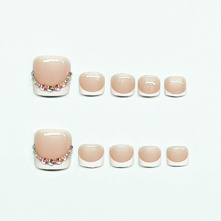 Nail art set with elegant French lace decoration and glitter accents Kalsten