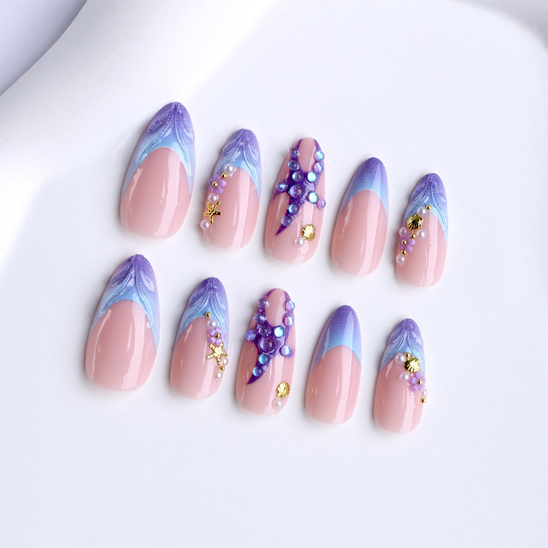 Artificial nails with maritime motifs and glitter accents Kalsten