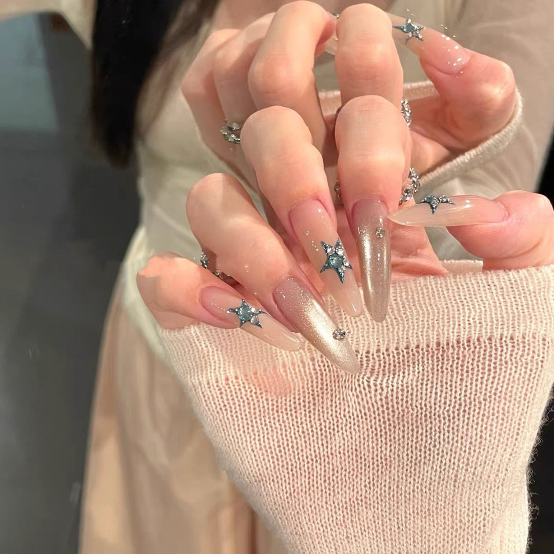 Glamorous artificial nails with star accents Kalsten