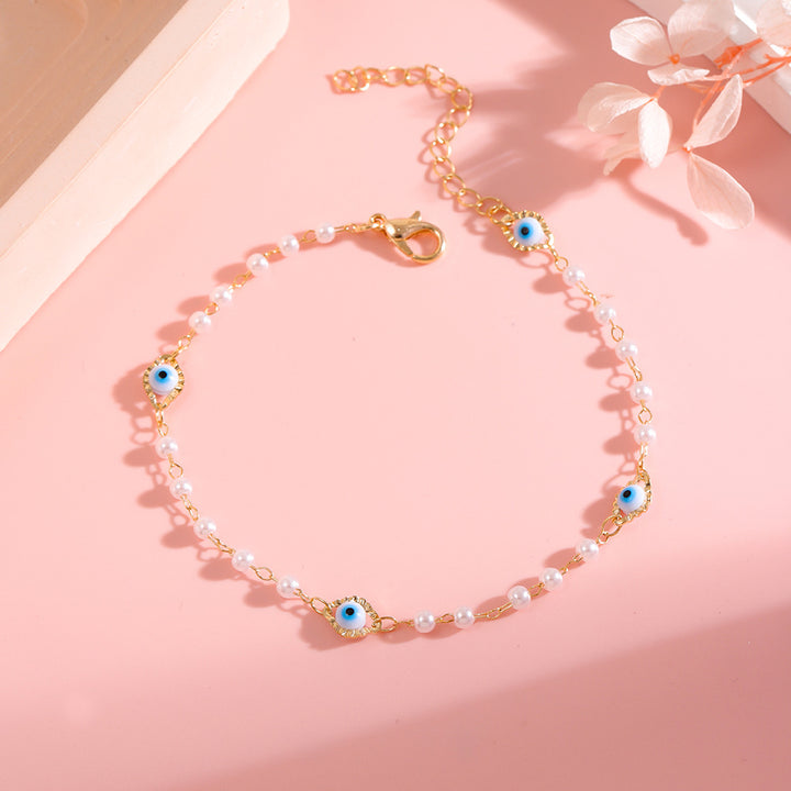 Elegant Pearl and Eye Charm Necklace Kalsten