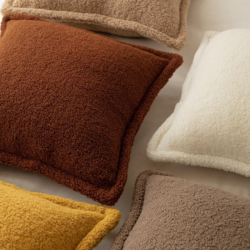Decorative teddy fleece cushion with padded filling and piped seam