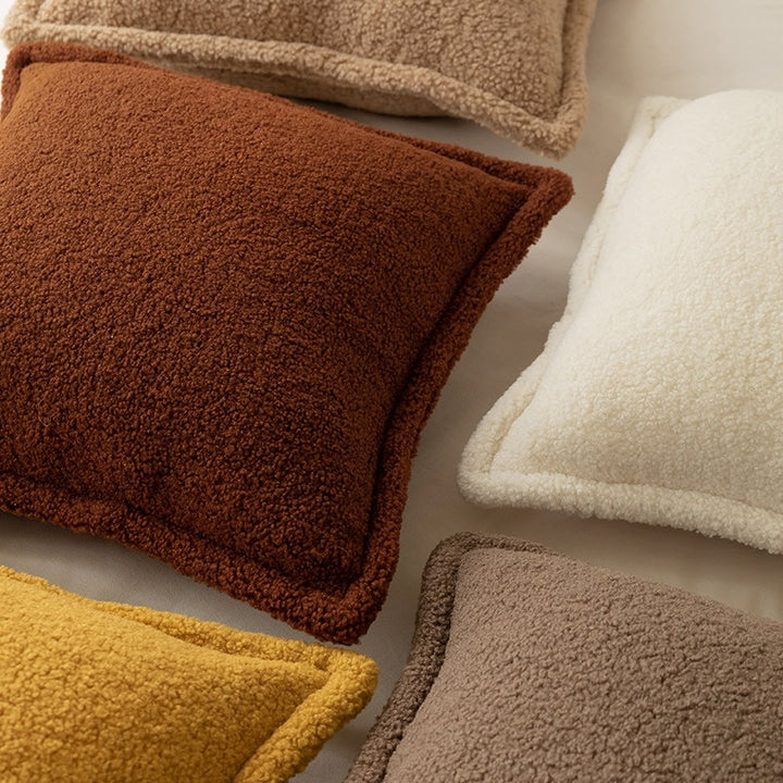 Decorative teddy fleece cushion with padded filling and piped seam