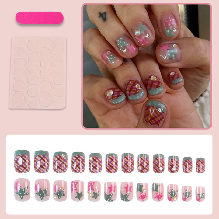 Artificial nail set with playful geometric designs and glitter accents Kalsten
