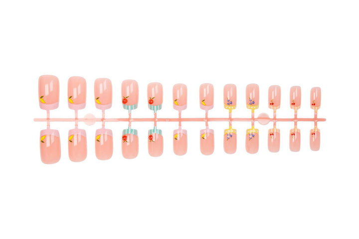 Nail art set with cheerful fruit designs and colorful accents Kalsten