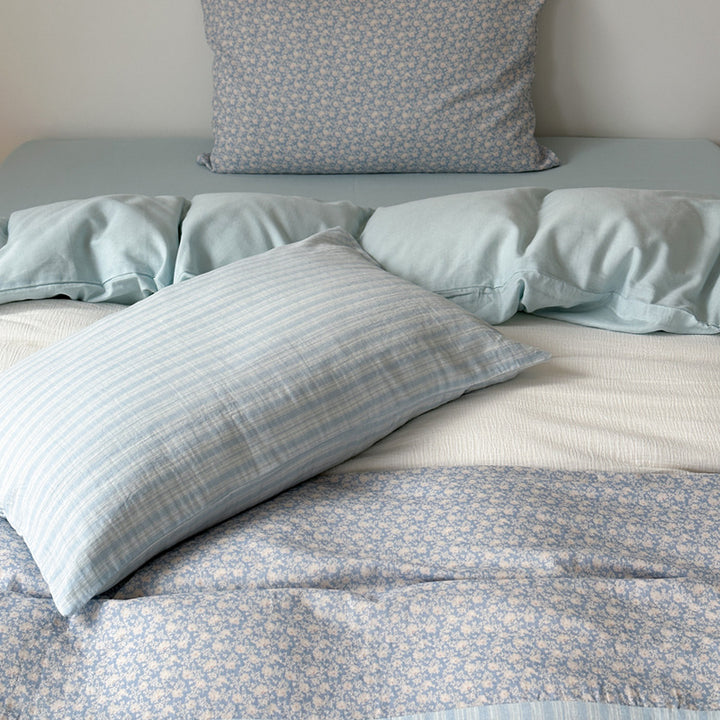 Luxurious cotton satin bedding set with striped and floral patchwork
