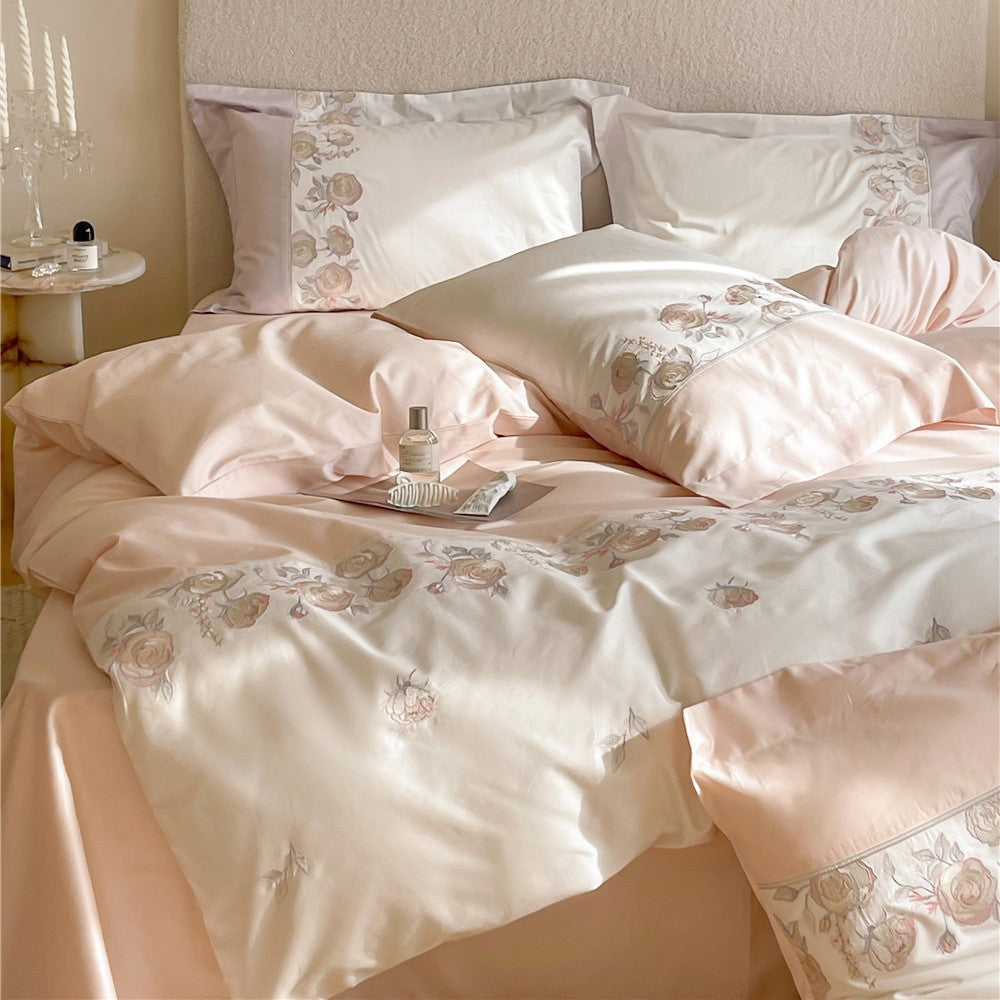 Premium bedding set made of cotton satin with floral border embroidery and reversible function