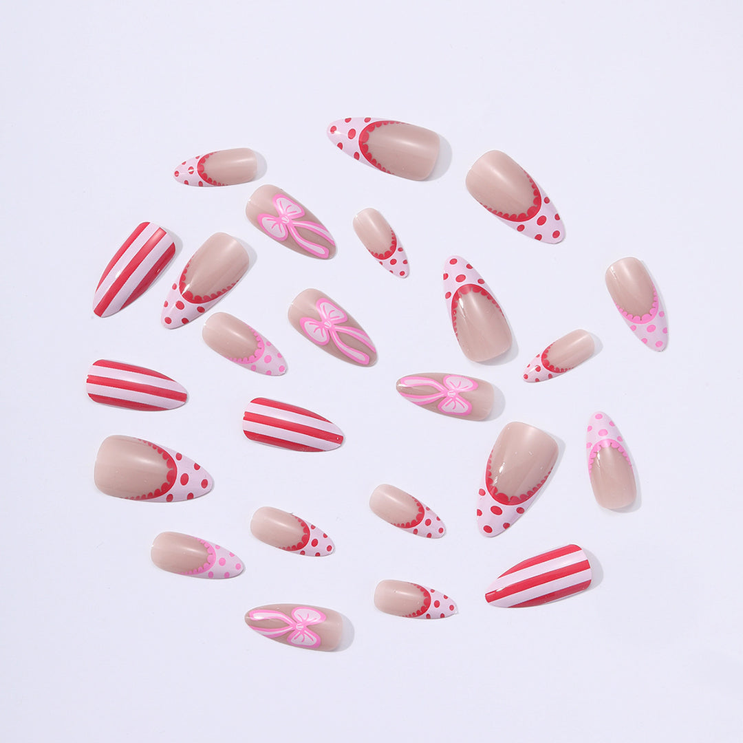 Nail set with playful bow and stripe pattern Kalsten
