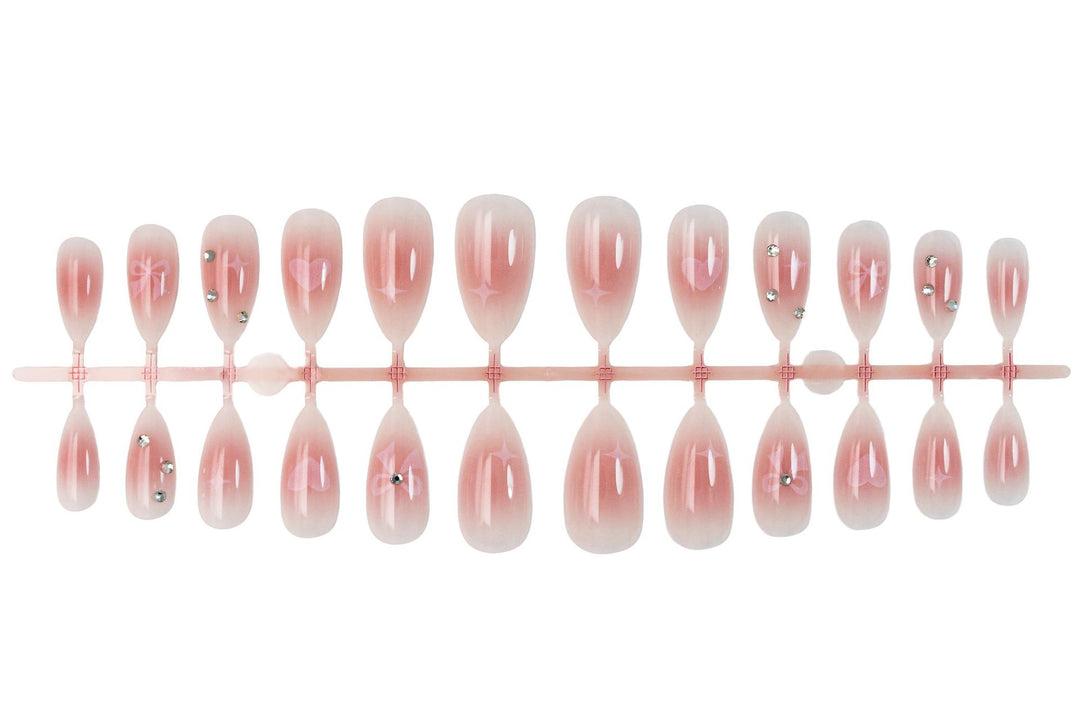 Artificial nail set with romantic heart and bow motifs Kalsten