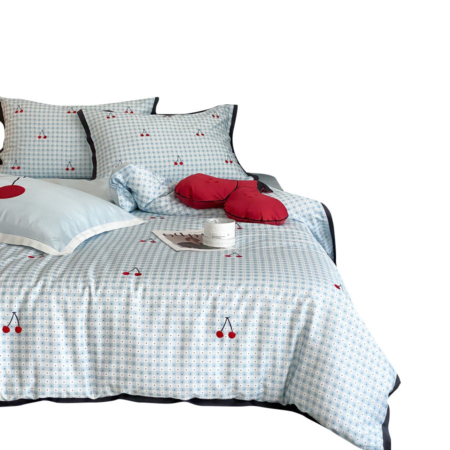 Playful cotton satin bedding set with cherry print and fine check pattern
