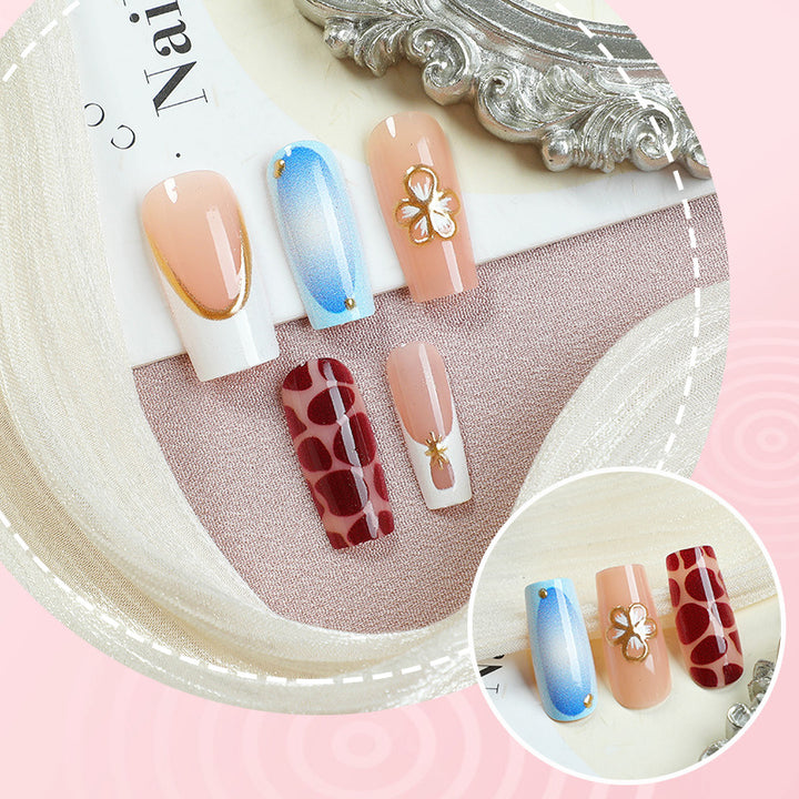 Artistic Press-On Nail Set with Floral Embellishments
