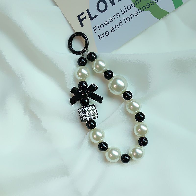 Elegant Pearl and Black Bead Charm Bracelet Kalsten