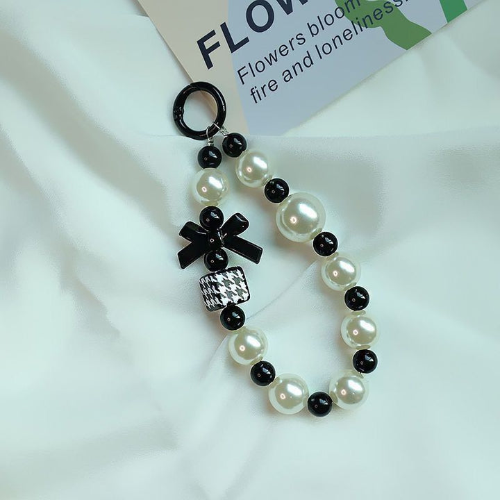 Elegant Pearl and Black Bead Charm Bracelet Kalsten