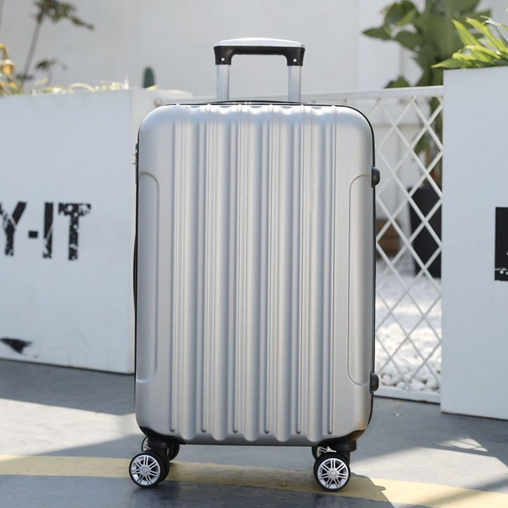 Hard shell suitcase with 360-degree wheel system and integrated safety feature Kalsten