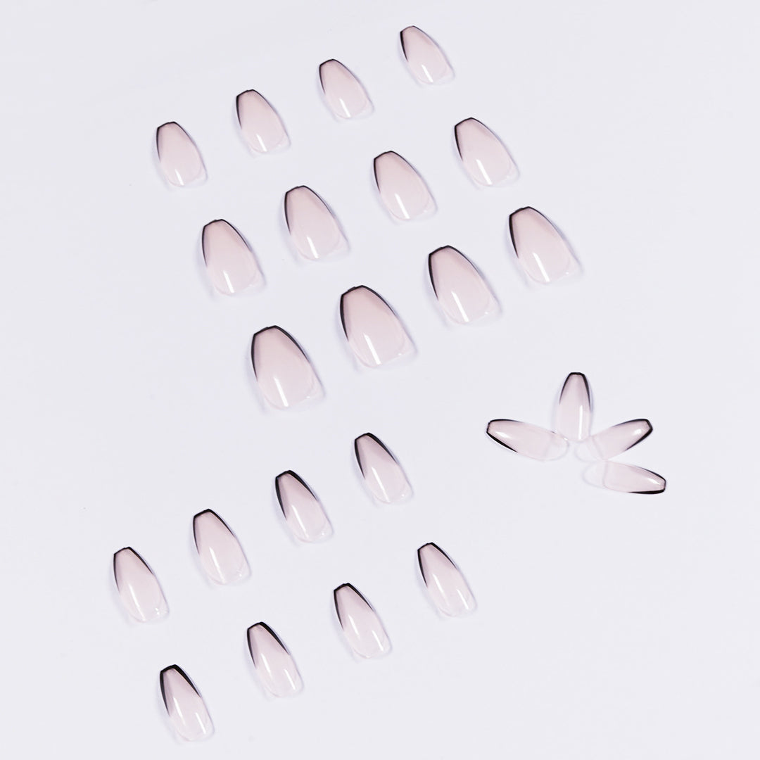 Artful stiletto nails with elegant black tip decoration Kalsten
