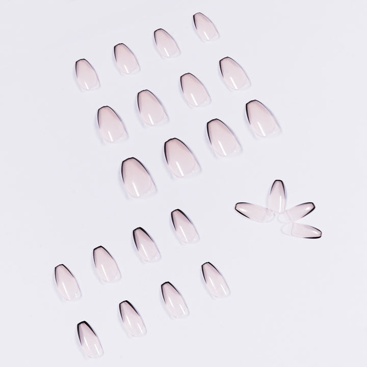 Artful stiletto nails with elegant black tip decoration Kalsten