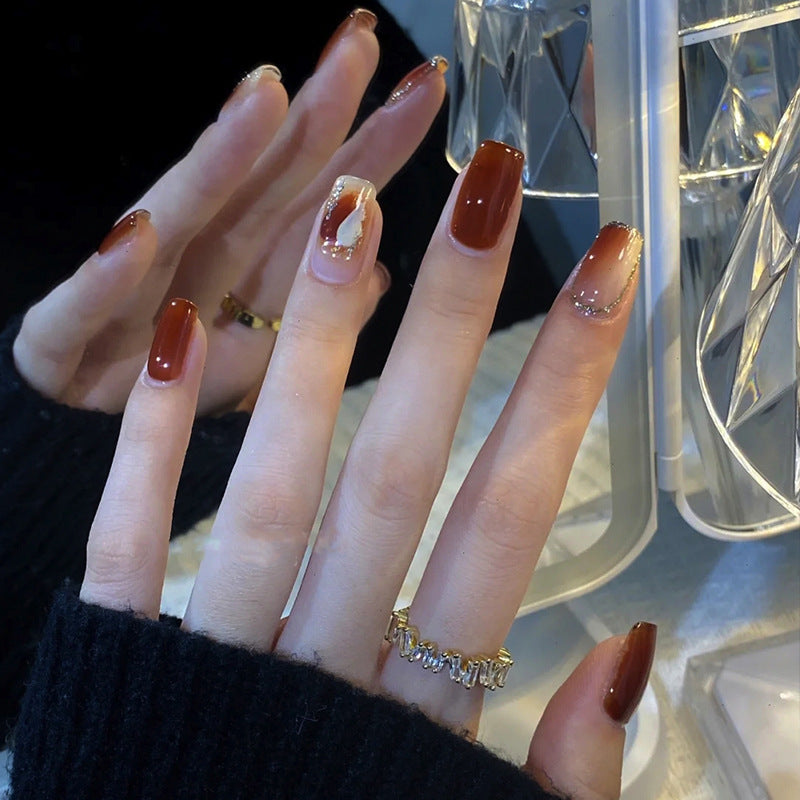 Elegant Glossy Press-On Nails with Gold Glitter Accents Kalsten