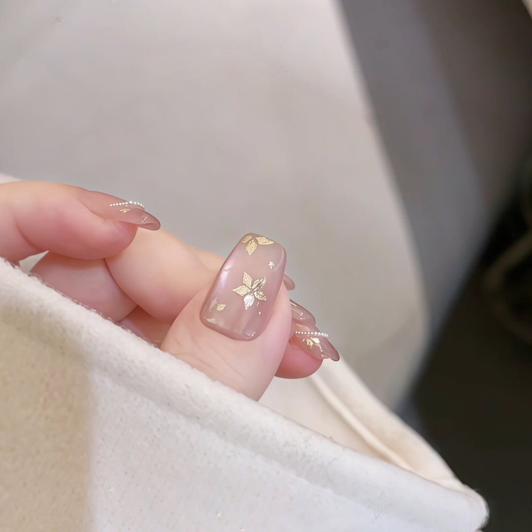 Artificial nails with elegant gold designs Kalsten