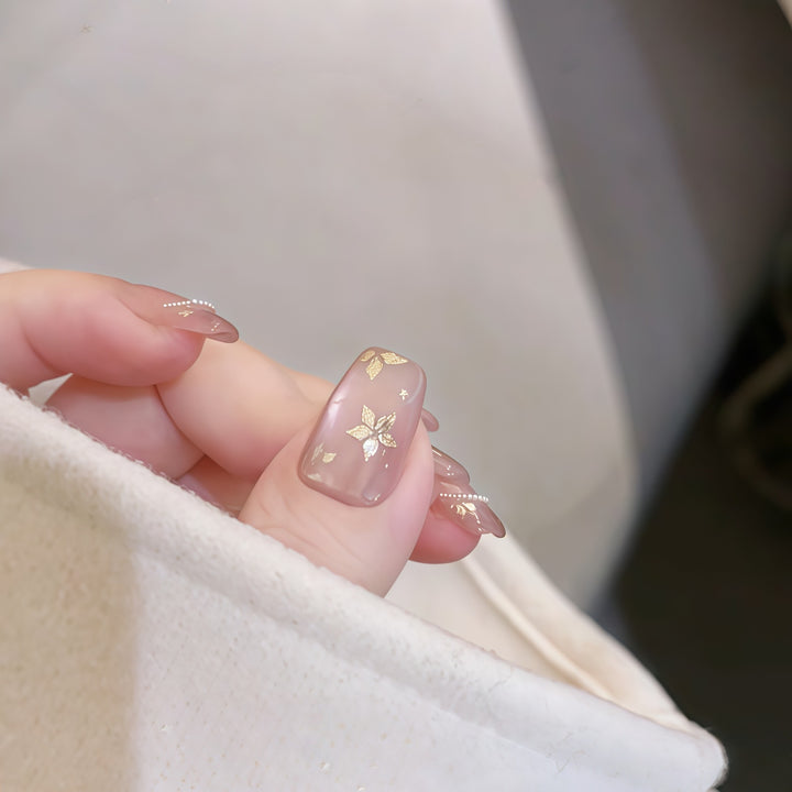 Artificial nails with elegant gold designs Kalsten