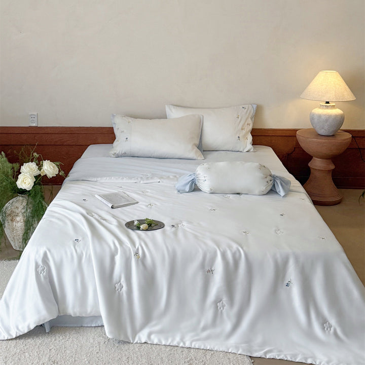 Embroidered satin bedding set with fine floral embroidery and silky-soft touch