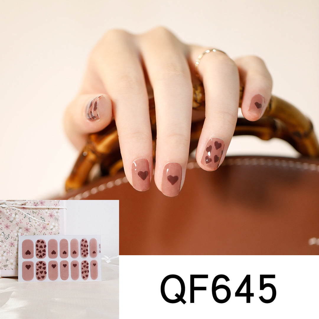 Artificial nail design with heart motif Kalsten