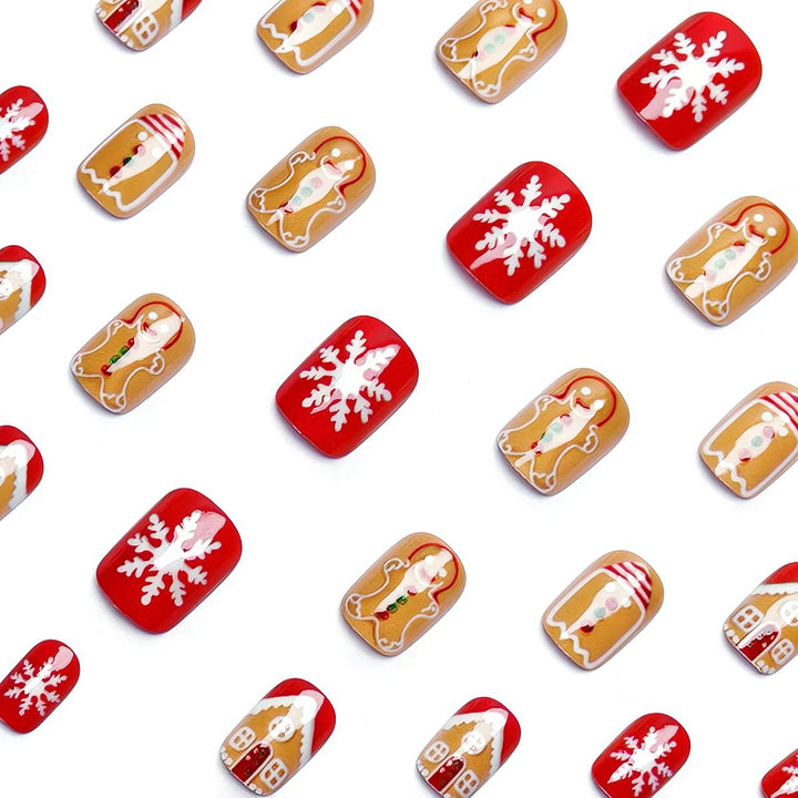 Artificial nails in Christmas gingerbread house design Kalsten