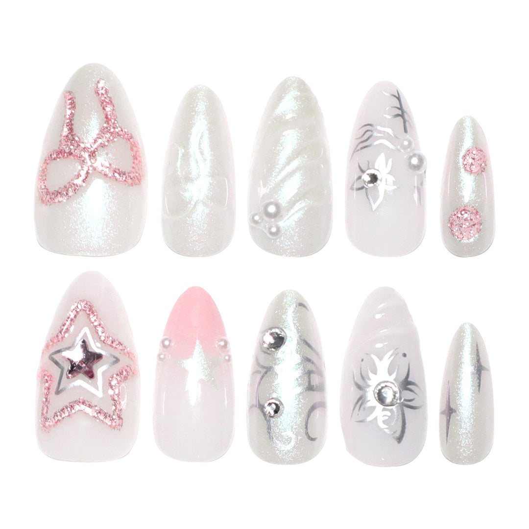 Artistic nail extensions with shiny embellishments Kalsten