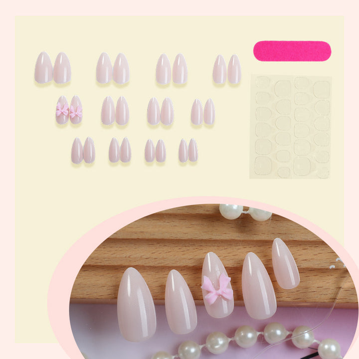 Acrylic nail set with cute bow design Kalsten