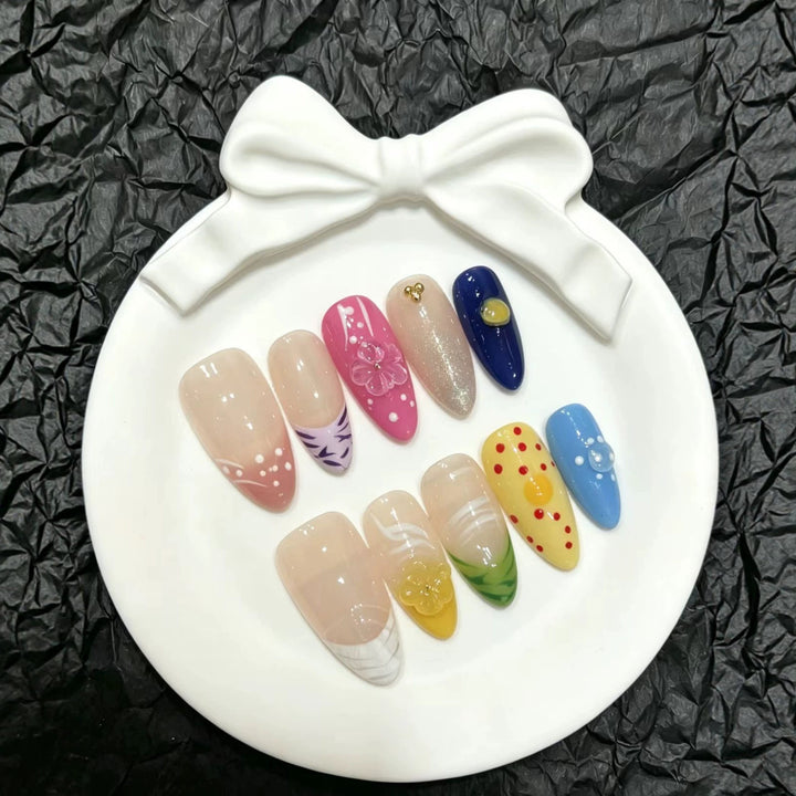 Artistic Press-On Nail Art Set with Floral and Colorful Designs