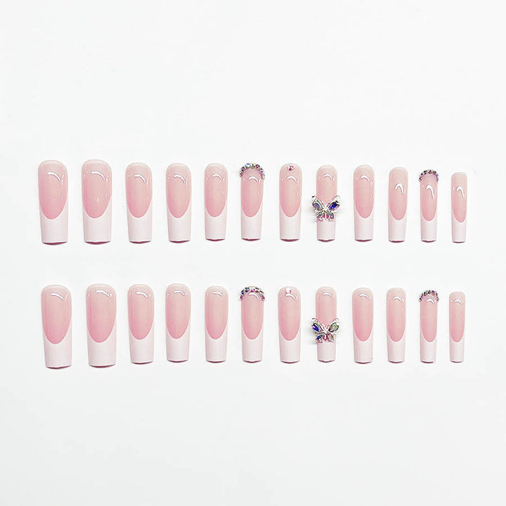 Acrylic nail set with elegant design and sparkling rhinestone accents Kalsten