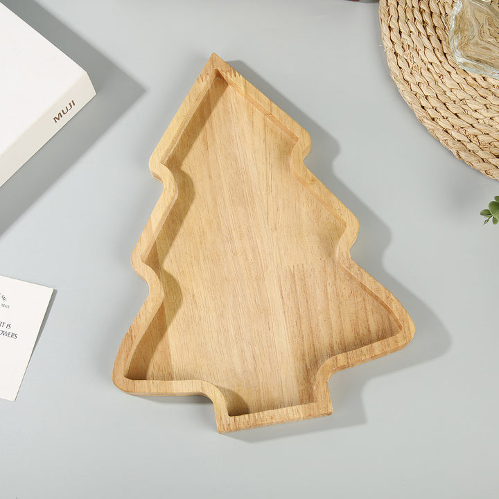 Christmas tree-shaped serving board made of solid wood with carved groove