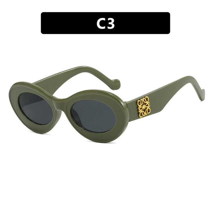 Women's fashionable sunglasses with oval frame and golden accents Kalsten