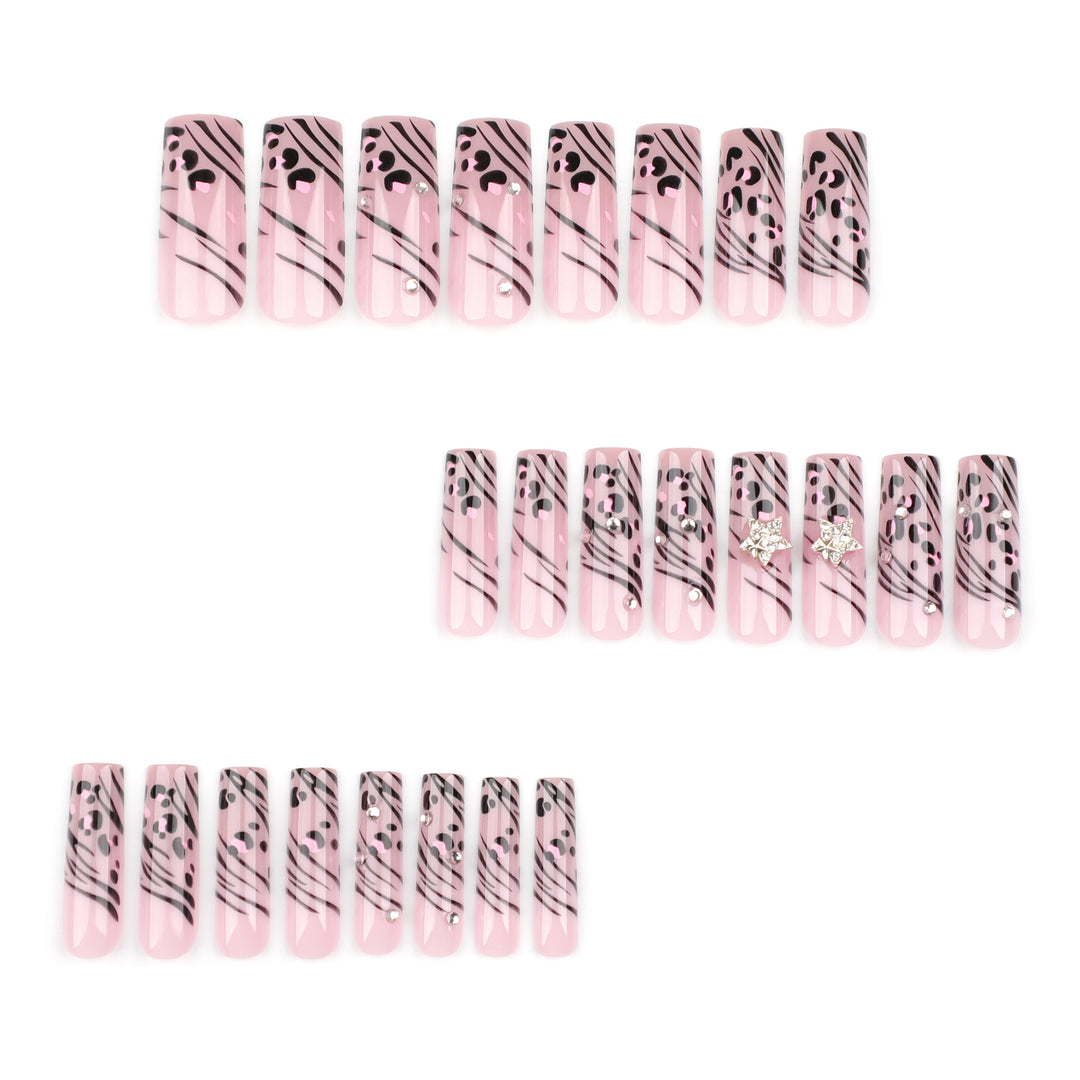 Artful Nail Art with Zebra Pattern and Glitter Accents Kalsten