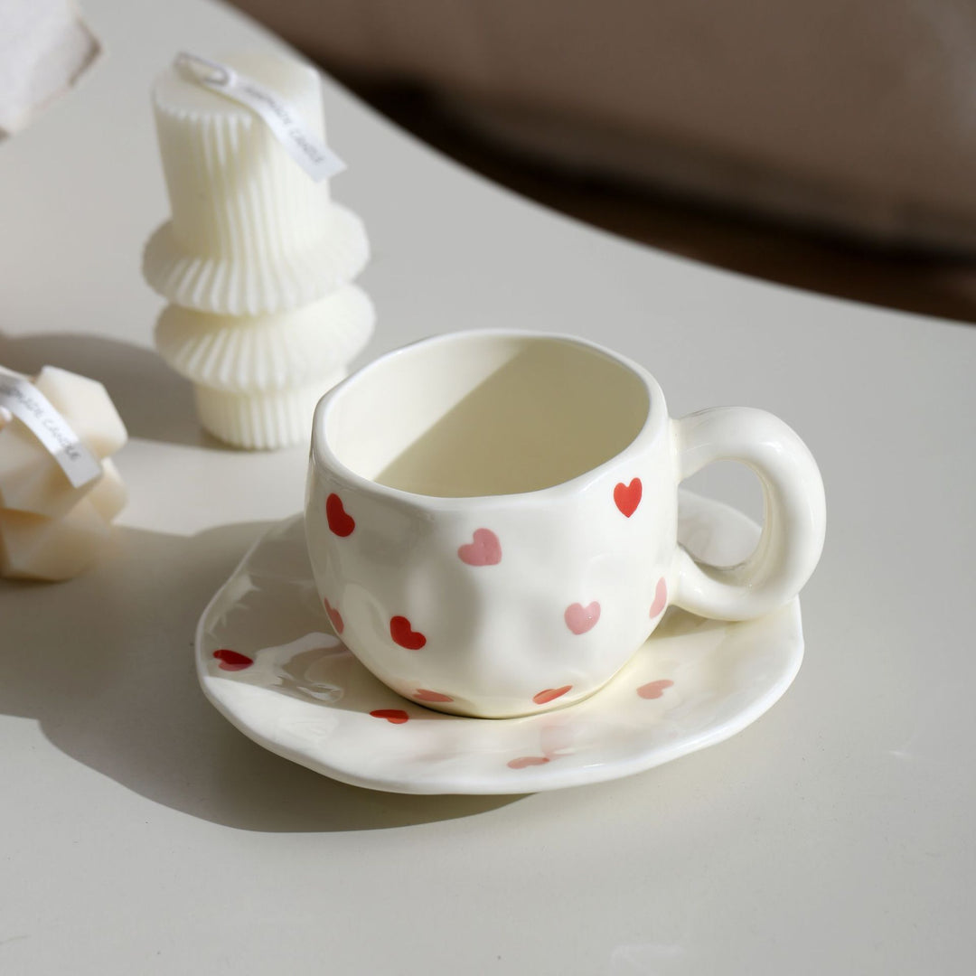 Ceramic mug with hand-painted tulip pattern and organic shape