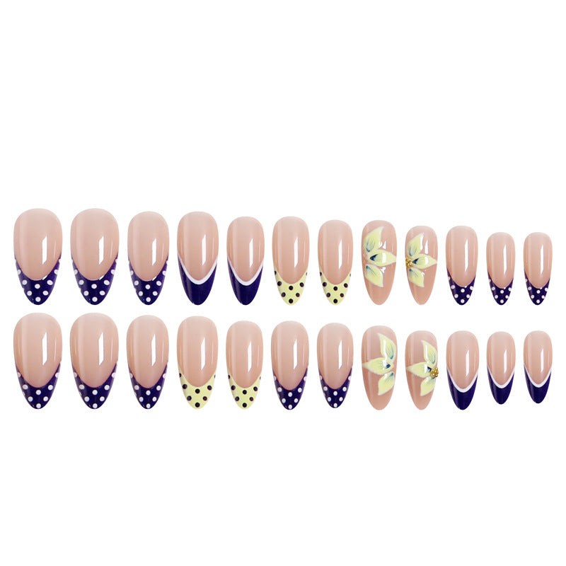 Artful nail tips with floral accent Kalsten