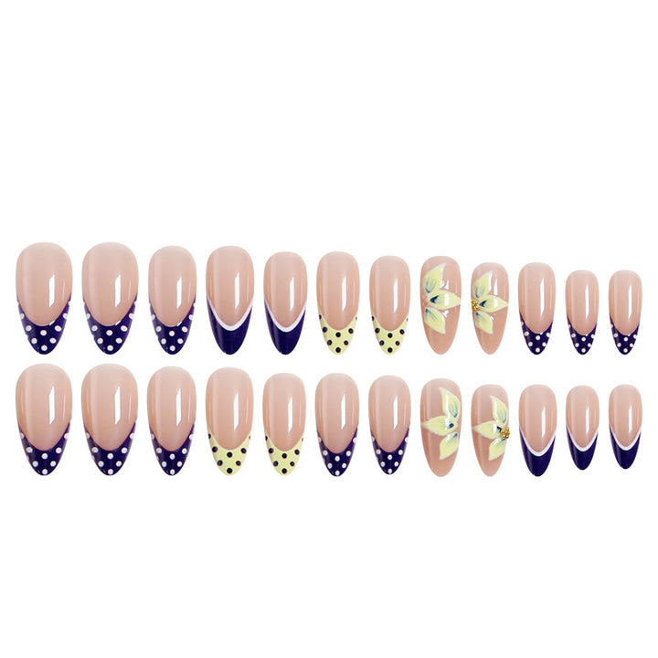 Artful nail tips with floral accent Kalsten