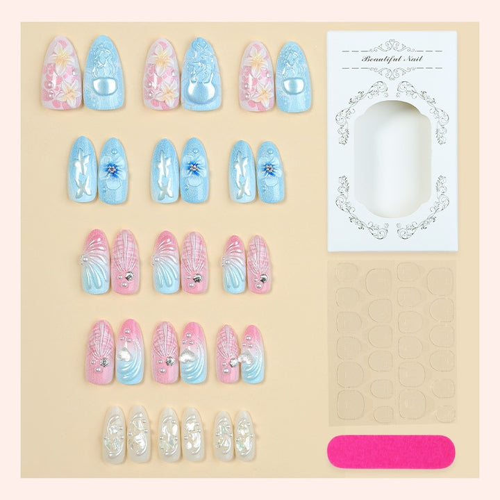 Artificial nail set with creative floral and glittering accents Kalsten