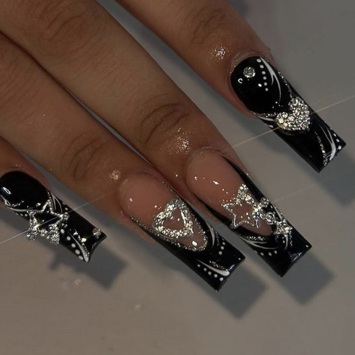Artistic Long Press-On Nail Design with Rhinestone Accents Kalsten