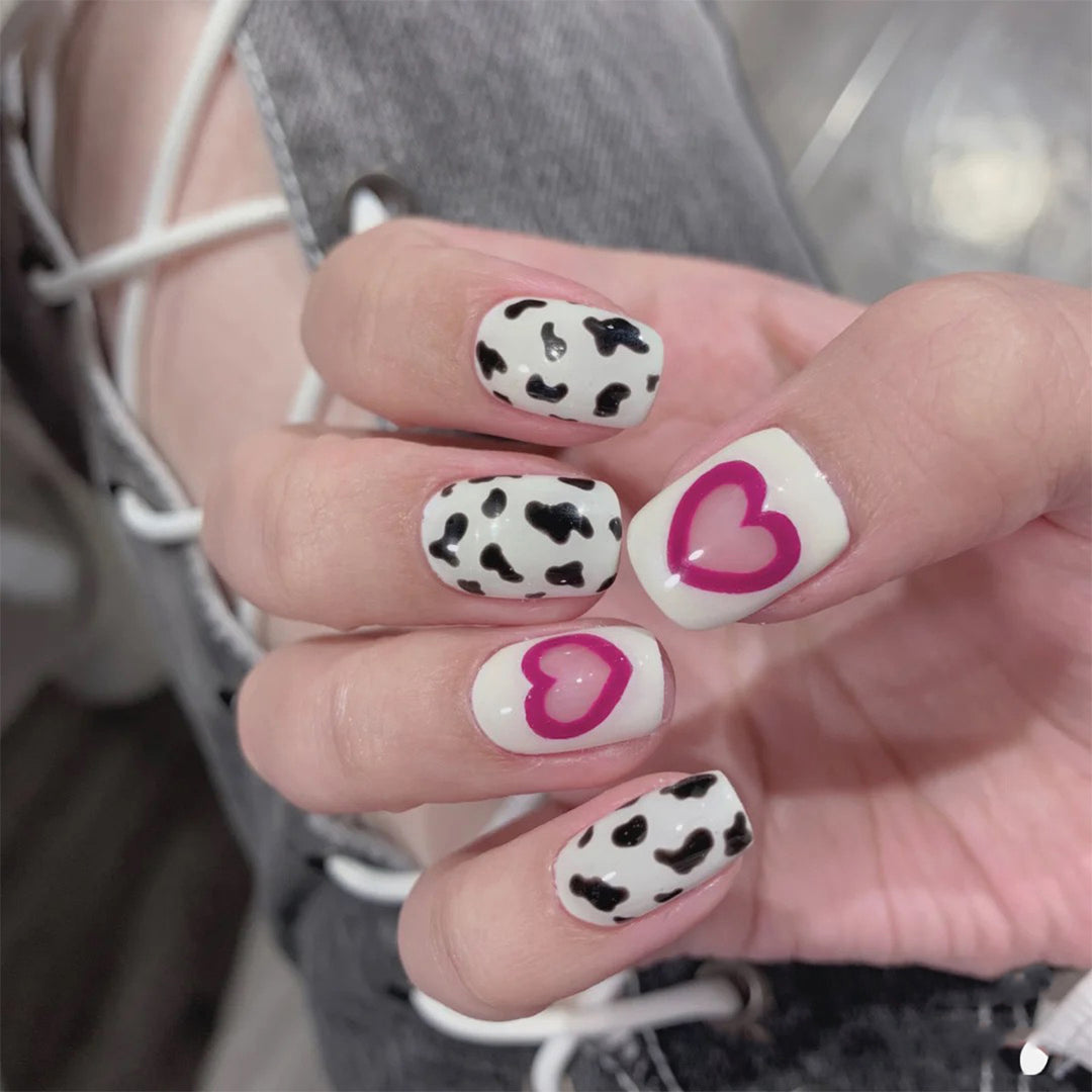Creative nail art with heart and animal pattern motif Kalsten