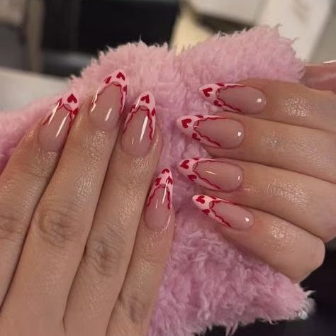 Acrylic nail set with elegant heart tips and creative accents Kalsten