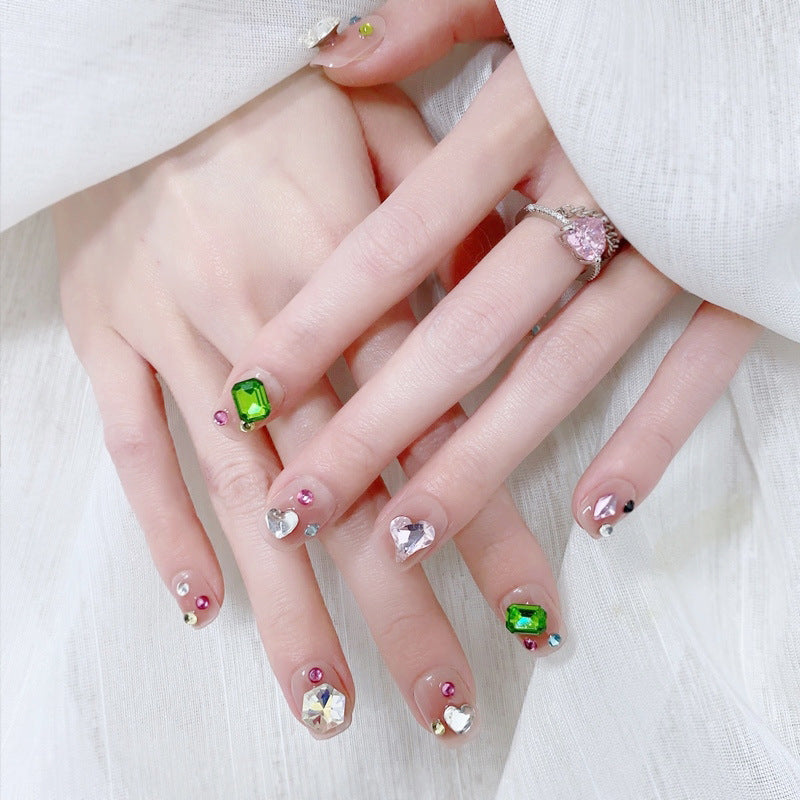Acrylic nail set with sparkling 3D applications and beautiful heart designs Kalsten