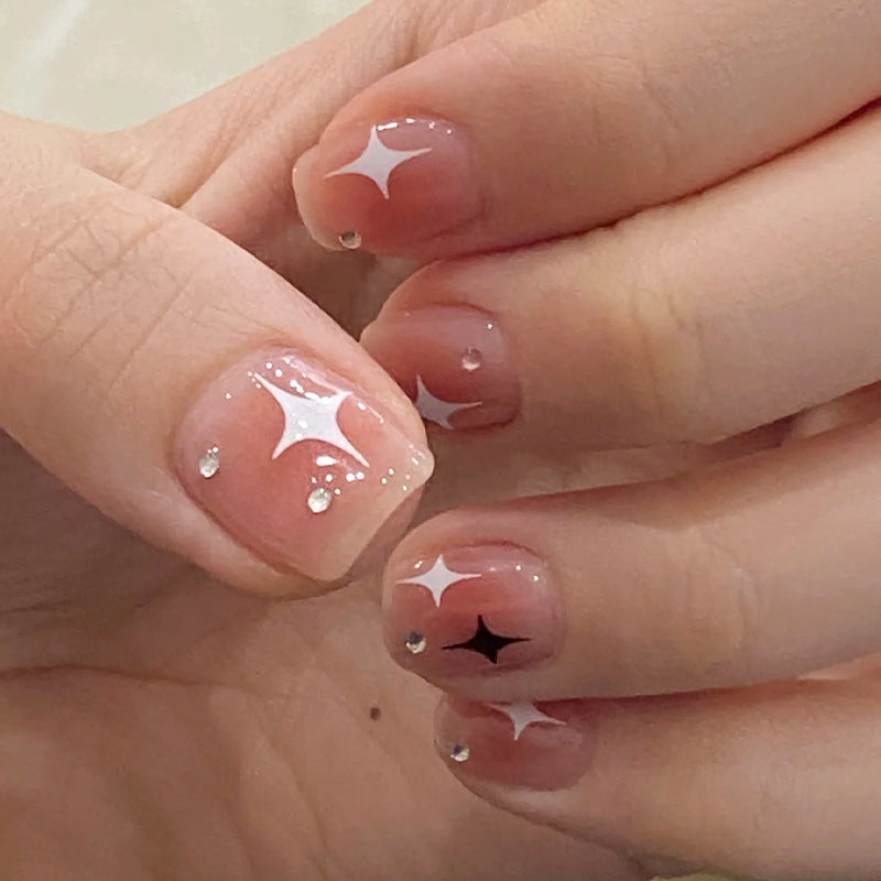 Acrylic nail set with sparkling star decorations and elegant accents Kalsten