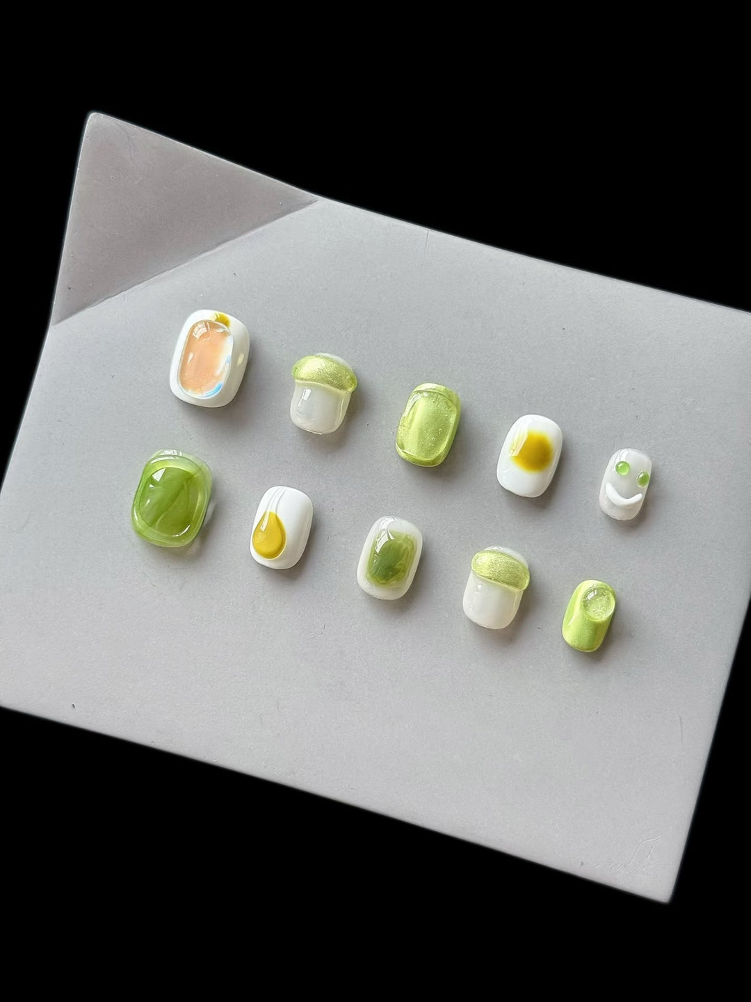 Artistic Press-On Nail Art Set with Playful Character Designs
