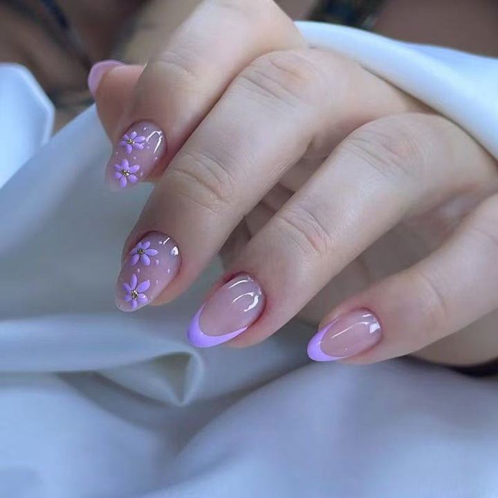 Creative artificial nails with floral accents Kalsten