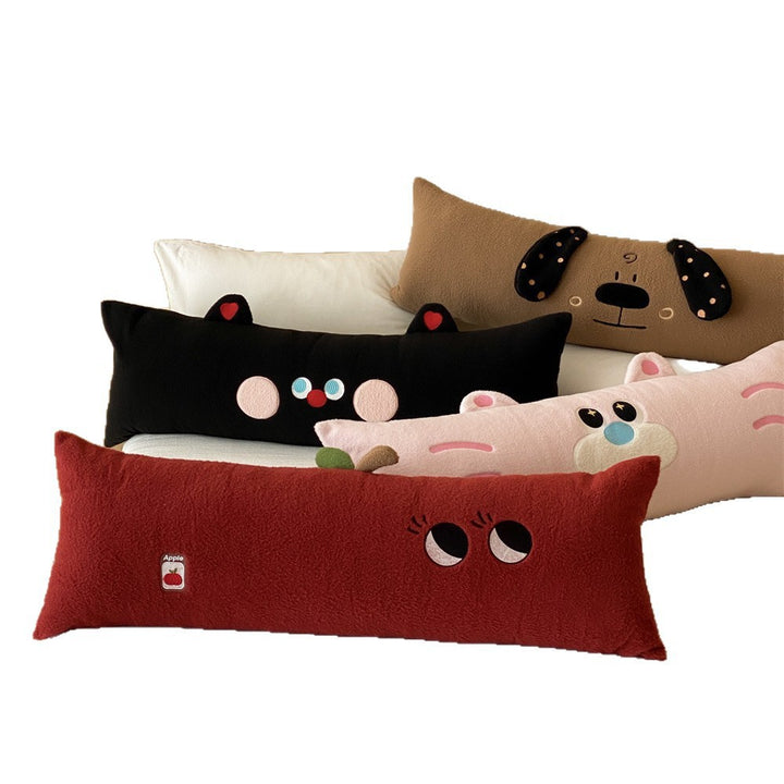 Extra-long plush sofa cushion with appliqués and plush feet